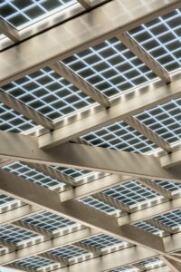 Abstract view of a modern solar panel structure with geometric patterns.